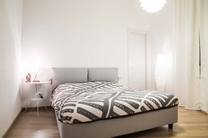 via-queirolo-camera-da-letto-appartamento-ristrutturato-pisa-Francesco-Martinelli